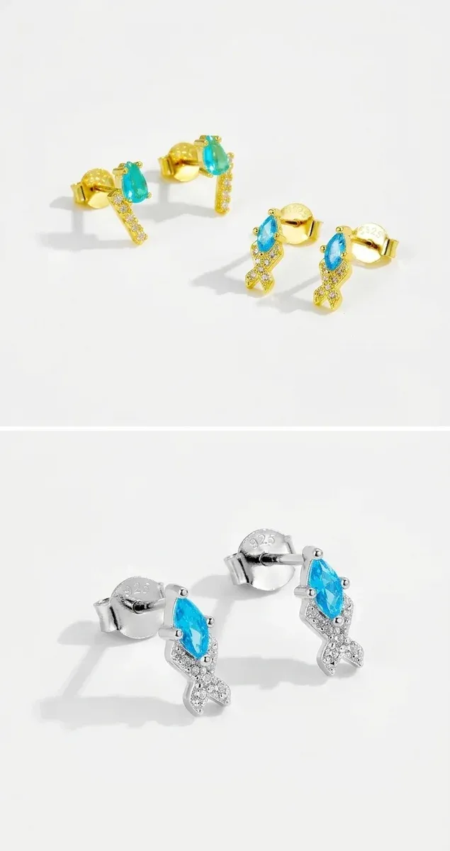 Сребърни обеци рибка със син циркон