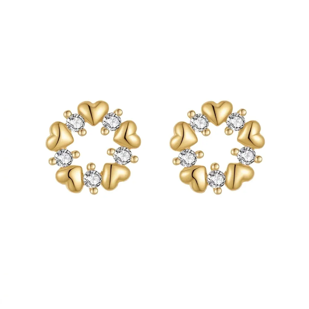 Златисти сърцевидни обеци с цирконии