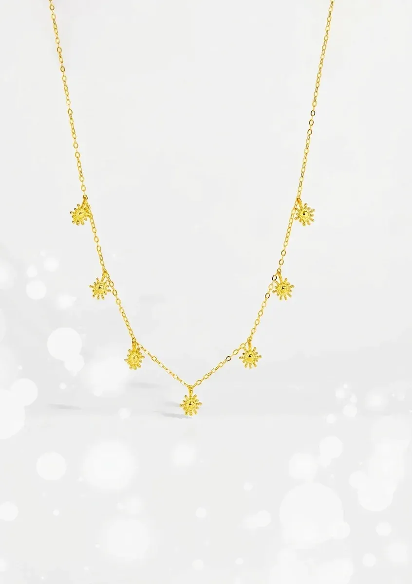 Златисто колие със седем слънчогледови висулки