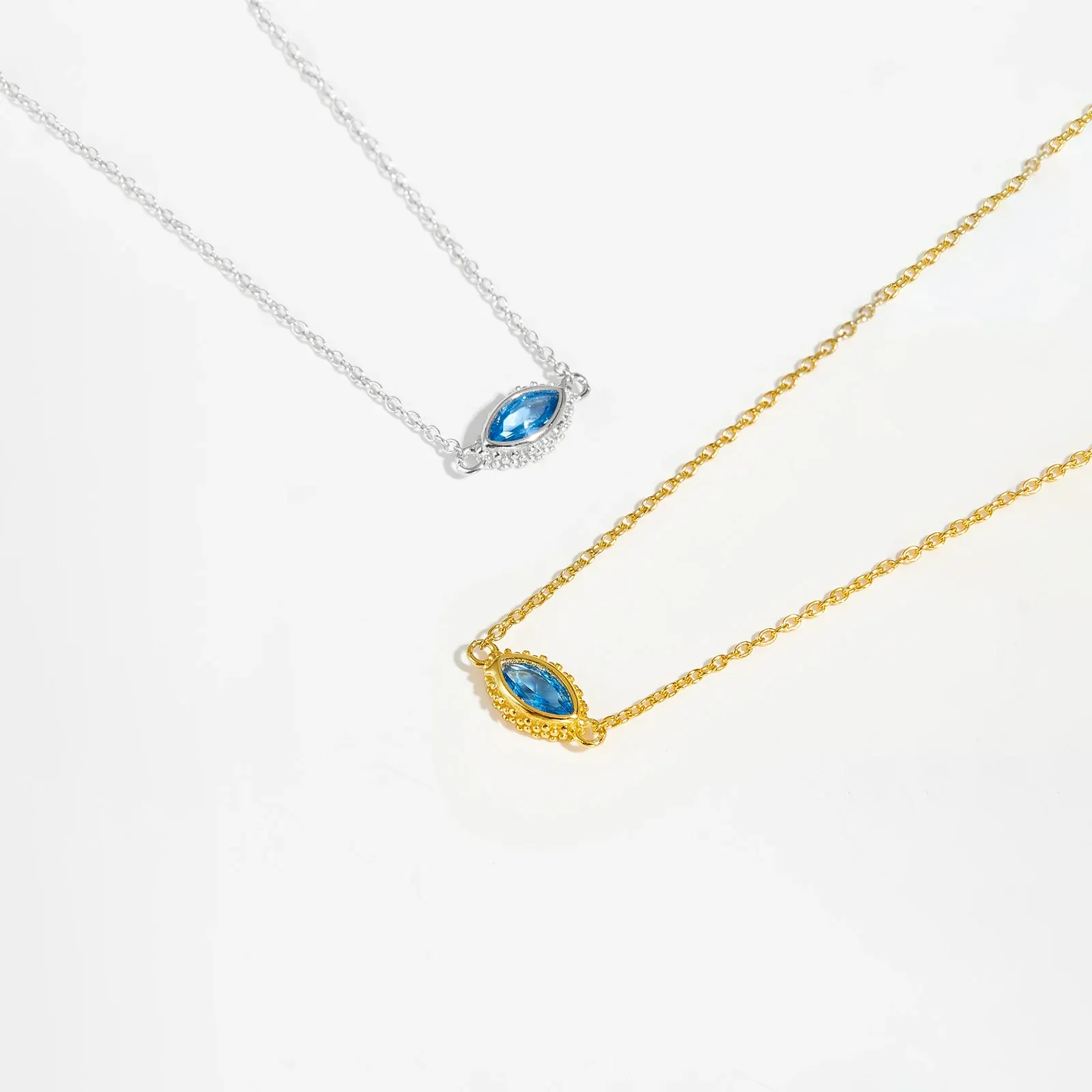 Сребърно колие с голям син „око“ и дълга верижка ANDYWEN