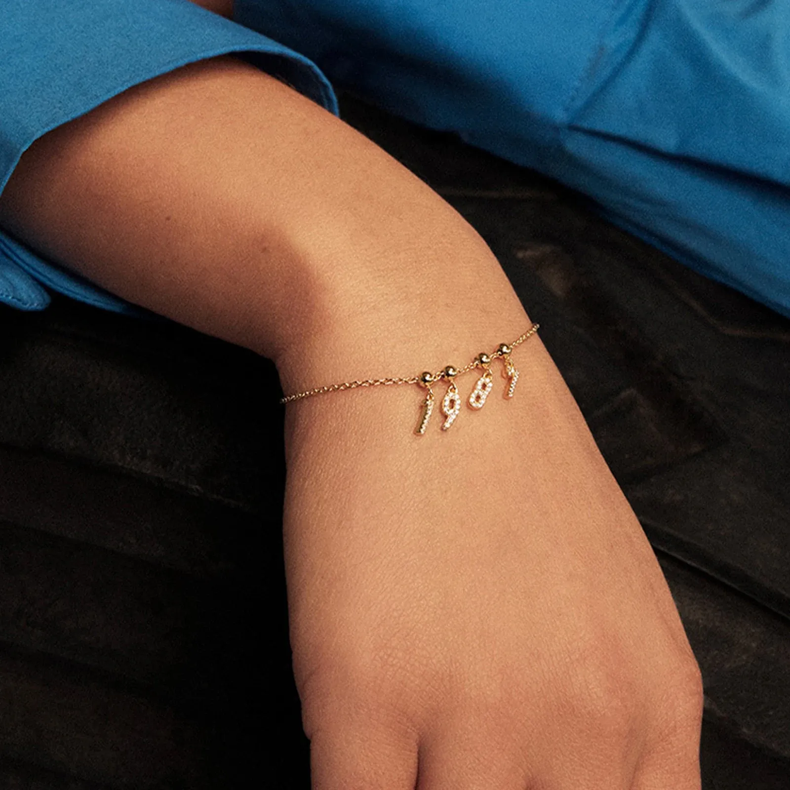 Сребърна чарм гривна с числа, динозавър, ключ и астронавт