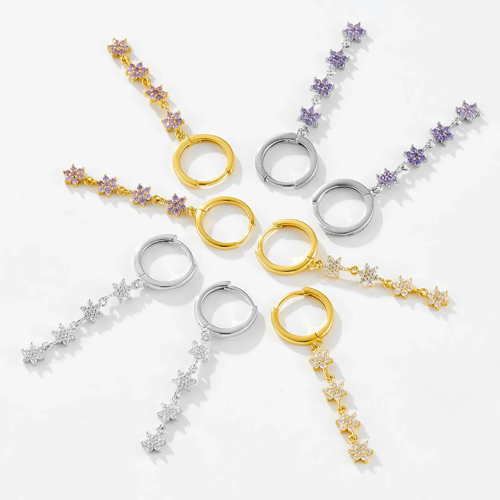 Финни сребърни обеци с лилав циркон и капковиден силует